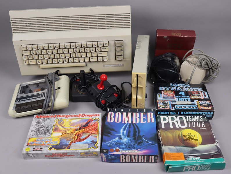 Commodore 64 med tillbehör och spel