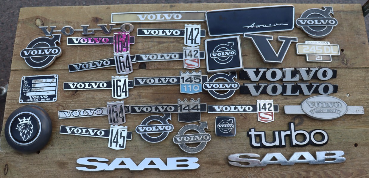 Volvo och Saab emblem