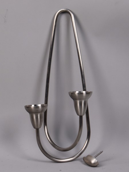 Jens Jensen för Georg Jensen, Danmark, "Swing", väggljusstake i stål